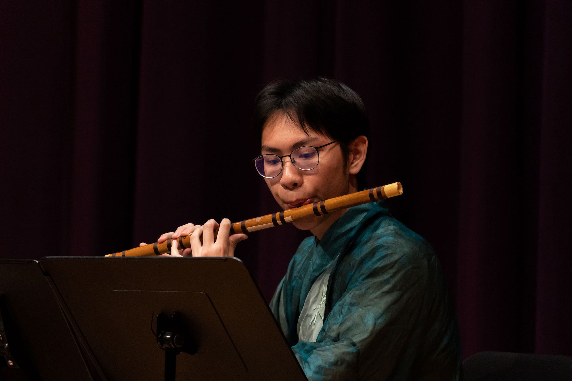 Photo of an instrumentalist playing the dizi