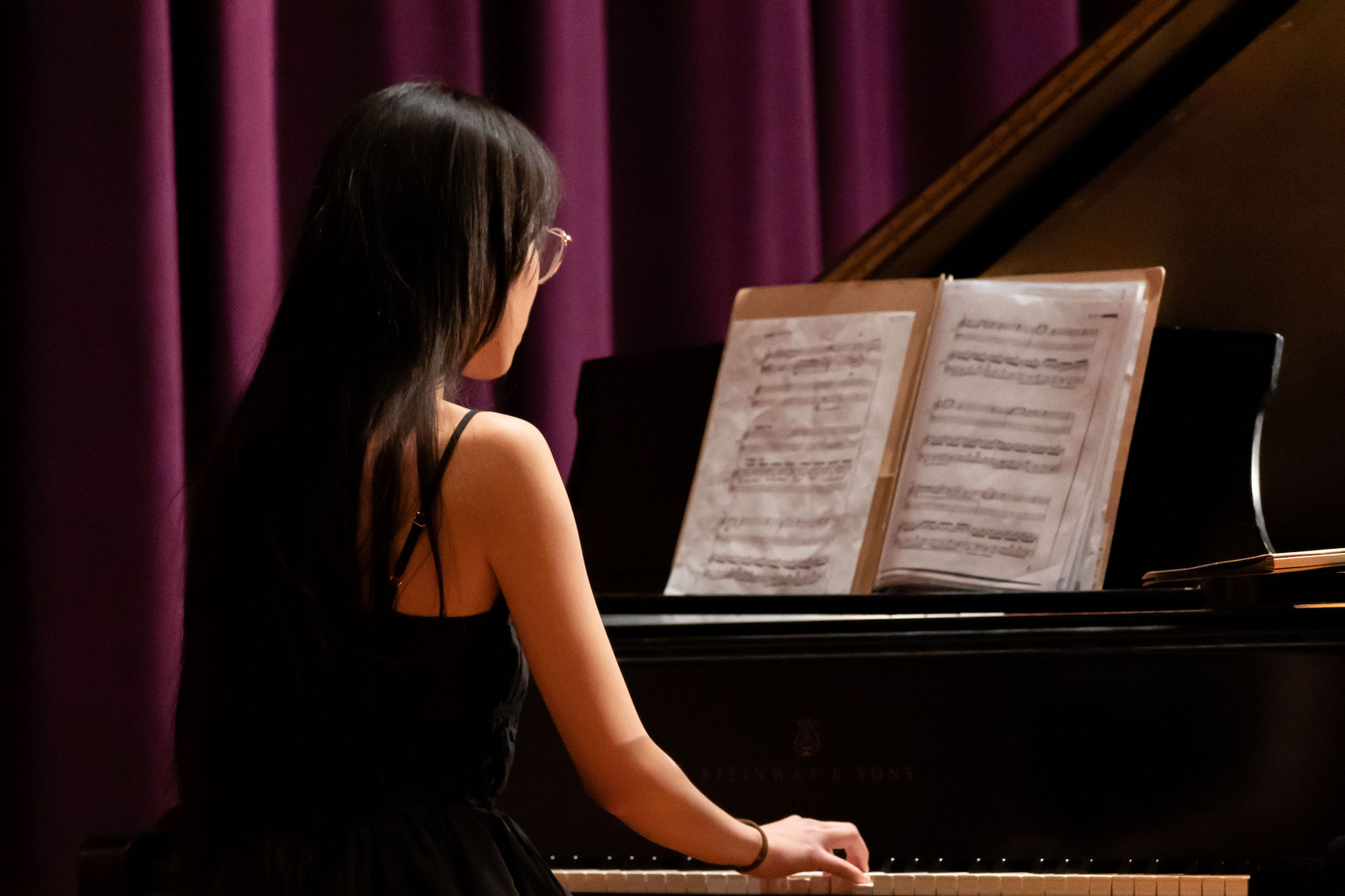 Photo of an instrumentalist playing the piano